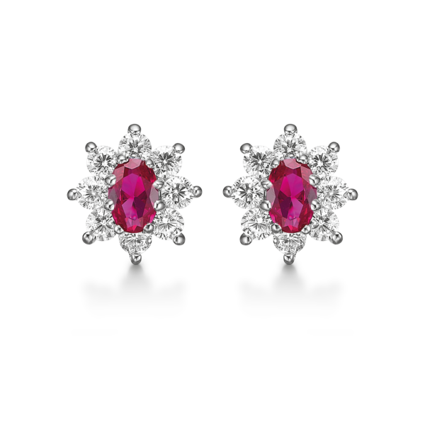 Silverörhängen rodiumpläterade ovala syntetiska rubin med 8 facetterade zirkoner runt om.