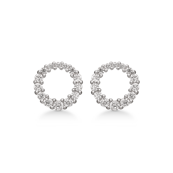 Silver öronproppar rodiumpläterade cirkel med facetterad zirkon i en lutning runt kanten.