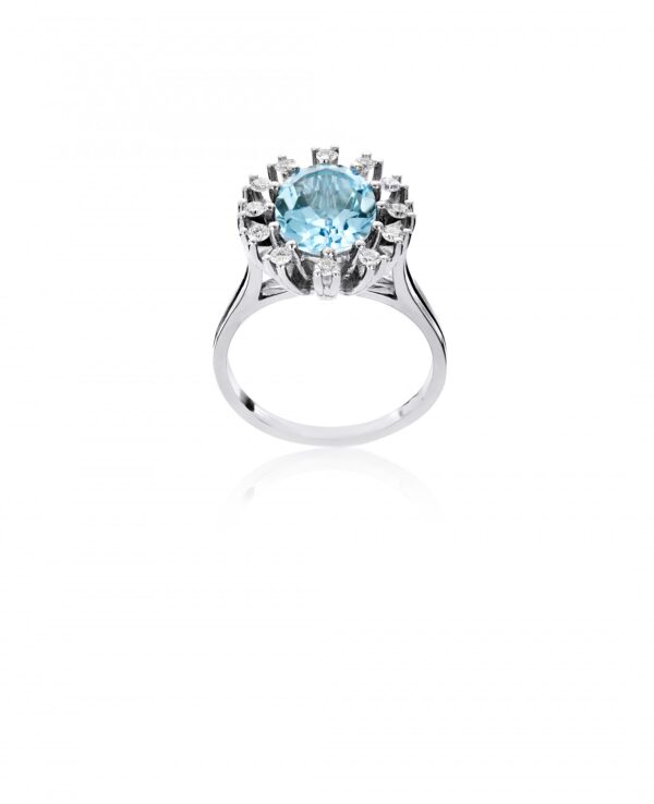 Guldring med blå topas och diamanter 12x0,03ct. W. SI. vitguld 585