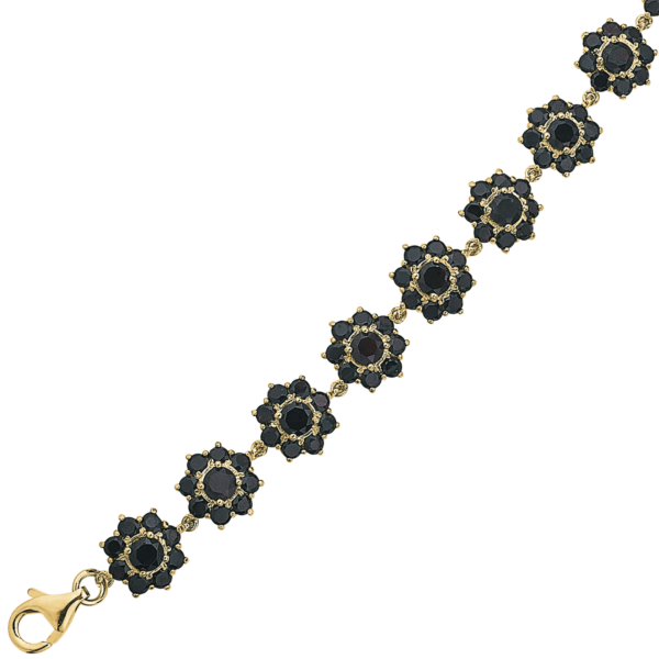 Silverförgyllt armbandsrosett med rund granat i mitten. Längd 17,5+2 cm.